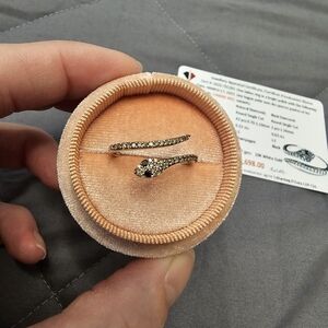 Elegant 10k White Gold Snake Ring With Champagne Diamonds